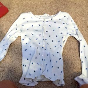 Selling a very cute long button down shirt